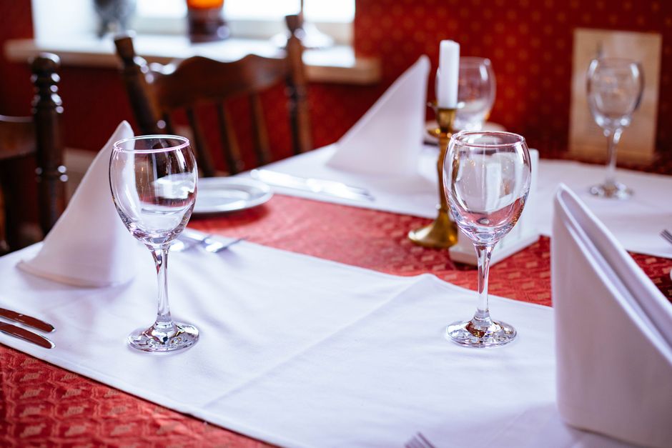 Fine dining elegant table setting and restaurant ambiance